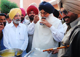 Chief Minister Parkash Singh Badal tasting the Dal prepared for inmates of the Central Jail, Bathinda, during his visit there on Monday.