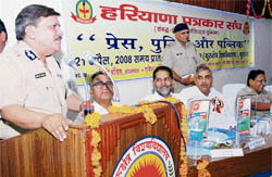 Haryana DGP Ranjeev Singh Dalal addresses a seminar organised by the Haryana Patrkar Sangh at Kurukshetra University in Kurukshetra