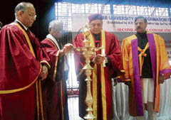 Chief Minister Prem Kumar Dhumal lights a lamp to mark the opening of the second convocation of Jaypee university, Waknaghat, on Monday. 