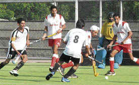 A match between Pakistan XI and Jarkhar Academy in progress on the opening day of the 6th All-India Jagtar Memorial Hockey Tournament (u-19) at Prithipal Singh Astro Turf Stadium in Punjab Agricultural University, Ludhiana, on Monday. 