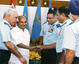 Defence Minister AK Antony being introduced to Indian Air Force Commanders by Air Chief Marshal FH Major (L) at IAF Commanders Conference in New Delhi