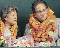 Maoist leader Prachanda (right) and his comrade Hishila Yami at a public function after winning the maximum seats in the Constituent Assembly elections in Kathmandu on Monday.