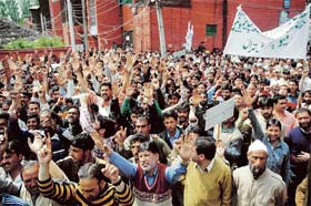 Employees of the All-Jammu and Kashmir Urban Local Bodies United Forum protest against price-hike in Srinagar