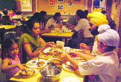A family enjoys an evening treat at Headquarters in Jalandhar