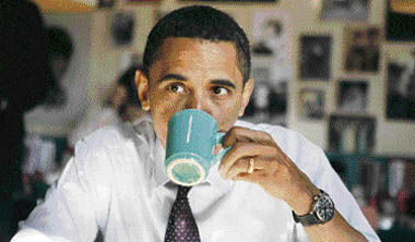 Democratic presidential candidate US Senator Barack Obama drinks coffee while having breakfast at Pamela's Diner in Pittsburgh, Pennsylvania, on Tuesday. Polls opened in Pennsylvania's presidential primary, with Hillary Clinton favoured to win, but unlikely to overtake Obama's overall lead in their marathon race for the Democratic nomination. 