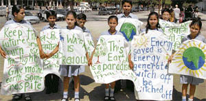 Students of Ashiana Public School spread the message of Save water and energy while celebrating the Earth Day at Sector 17 plaza in Chandigarh on Wednesday.