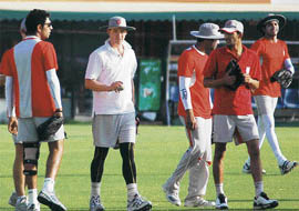 Kings XI Punjab team hone their fielding skills at the stadium before taking to nets in Mohali on Wednesday.