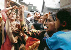 Women protest against the killing of two top Hizbul militants in Baramulla on Wednesday.