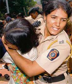A policewoman 'in action' during a protest by students of diploma in education against the Maharashtra government outside Mantralaya in Mumbai