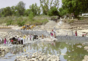 A scene of repair work being carried out at the UBDC headworks main canal at Madhopur near Pathankot on Wednesday. 