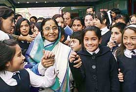 President Pratibha Devisingh Patil interacts with students of the Escuela Republica de la India (Republic of India), a Chilean municipal school in Santiago on Tuesday. The students here pay homage to the nation of a billion people through Indian National Anthem during morning prayers. 