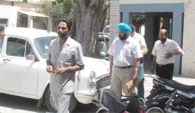 A vigilance team arrives at the municipal council premises in Abohar to enquire into the complaints.