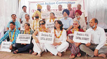 PUTA members sit on chain fast in Panjab University, Chandigarh, on Thursday.