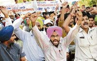 Members of ITI's employees union, Punjab, protest in Chandigarh on Thursday.