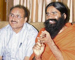 Baba Ramdev addresses mediapersons in Ludhiana on Thursday.