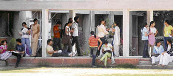 Students crowd the corridors before the beginning of an exam in Chandigarh on Friday.
