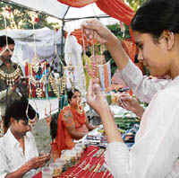 A visitor looks at a jewellery stall at Vatika School, Sector 19, Chandigarh, on Friday. 