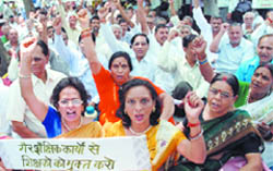 Members of the All India Teachers Orgaanisation demand better pay scales and revamp of higher education in the Capital