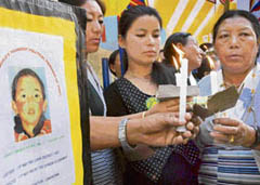 Tibetans take out a candlelight march to celebrate the 19th birthday of 11th Panchen Lama Gendun Choekyi Nyima at Shimla on Friday.