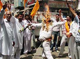 Shiv Sena activists protest against inflation in Patiala on Saturday.