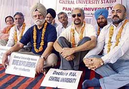 Deans, Panjab University, observe a relay fast on the PU campus in Chandigarh on Saturday.