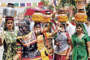  Women participate in the shobha yatra of Lord Jagannath in Sonepat on Saturday.