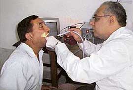 Dr Sanjay Sachdeva, director and head of the ENT Department at Fortis, Delhi, examines a patient during a free ENT camp at Kangra on Sunday. Over 110 persons were examined and provided treatment for various ENT ailments at the camp. The camp was oragnised by the local unit of the Vivekananda Kendra and Shri Ripudaman Charitable Trust. Fourteen patients were shortlisted for free surgery. 