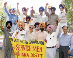 Activists of the Ex-servicemen Welfare Society stage a protest in Ludhiana on Sunday.