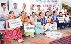 Students and teachers of Panjab University at a chain fast in Chandigarh