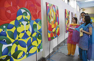 A feast of colours at painting exhibition 'See My Red' organised by students of the HPUs Department of Visual Art at the Indira Gandhi sports complex in Shimla on Monday.