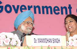 Prime Minister Manmohan Singh and Union Minister of State  for Women and Child Development Renuka Chowdhury during the inauguration of national meeting on Save the Girl Child in New Delhi on Monday. 