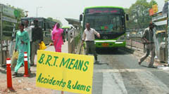 A placard placed by the youth activists of Delhi BJP at the BRT corridor near Moolchand flyover in the Capital on Tuesday. 