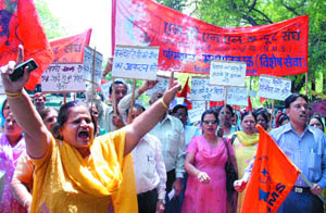Activists of the MTNL Majdoor Sangh demand payment of pension money from the government treasury during their march to Parliament in the Capital on Tuesday.