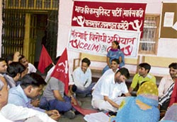 CPI workers stage a dharna in front of the office of the SDM, Palampur, in protest against the rising prices and the failure of the state and the Union governments to check the hike