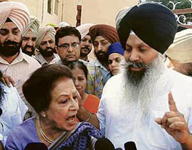 Principal of Lawrence Public School Veena Malhotra addresses members of the SGPC on the school premises in Mohali on Wednesday.