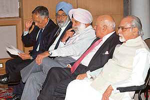 Former Prime Minister I. K. Gujral, along with S.S. Sodhi and other guests, at the release of "The Tribune 125 Years: An Anthology" in New Delhi on Wednesday