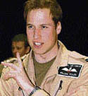 Britain's Prince William gestures during his visit to Kandahar airfield, Afghanistan on Monday. Prince William paid a secret visit to Afghanistan to meet frontline British troops, his office said. 
