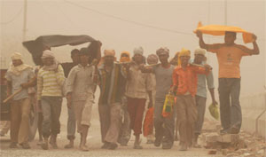 Daily wage earners in the city were caught in the middle of a dust-storm that hit the region on Thursday evening, throwing normal life out of gear.