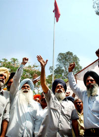 Members of MES Workers Union celebrating May Day in Bathinda on Thursday.