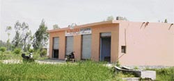 Despite a ban, people still continue constructing houses and commercial buildings on agricultural land in Jammu