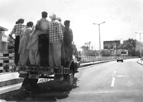 An overloaded tempo on the Kurali bridge, near Ropar