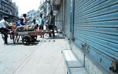 A busy market place at Jhandewalan Road wears a deserted look during Delhi bandh on Friday.