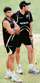 Kolkata Knight Riders captain Sourav Ganguly with Umar Gul at PCA stadium in Mohali on Friday.