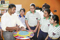 Biswaroop Roy Chowdhary along with the students of Chaman Vatika School, near Ambala, on Saturday.