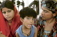Wife and mother of Goldy, who was killed in an attack, at Saharanpur village on Saturday.