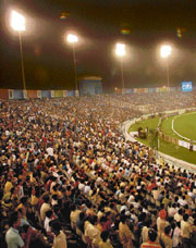 Spectators throng the PCA stadium in Mohali for the tie between Kings XI Punjab and Kolkata Knight Riders on Saturday.