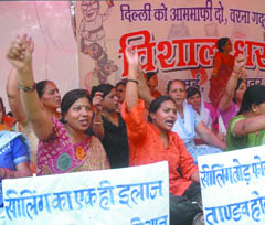 Bhartiya Janata Party activists protest against rise in prices of essential goods and the ongoing sealing drive at Jantar mantar in the Capital on Saturday. 