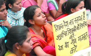 Contractual teachers demand increase in pay scales and permanent status during a demonstration in the Capital on Saturday. 