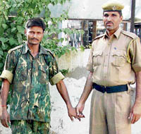 CRPF jawan J.P. Pathak, who allegedly killed his colleague Ajit Laharia, in police custody in Gurgaon on Saturday.