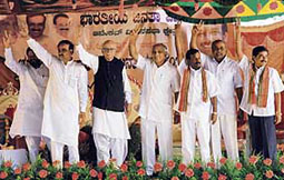 BJP leader L.K. Advani with former Karnataka Chief Minister B.S. Yedyurappa and Ananth Kumar during an election rally in Anekal Taluk near Bangalore on Saturday.